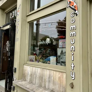 a bench in front of a store