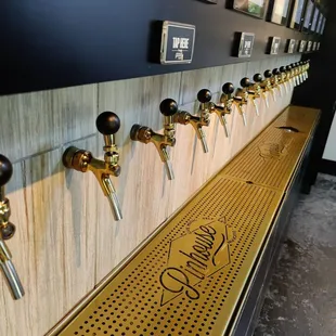 Taps all along the wall