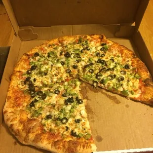 Veggie pizza - comes with broccoli, onions, olives and green peppers.  Large, delivery on a busy Friday night. $16.53.