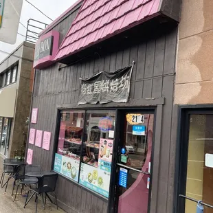 Chinese banner is so faded and falling apart