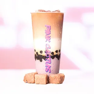 Black tea latte with boba and taro