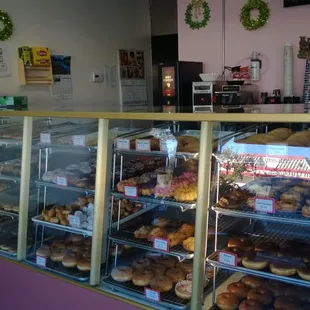 a display case filled with donuts