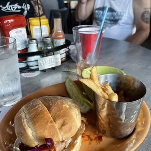 Best pulled pork sandwich EVER with slaw and fries.