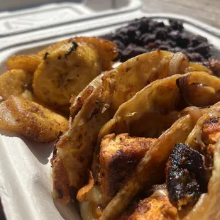 Quesadilla dinner with blackened whitefish. Sides: beans and fried plantain.