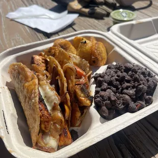 Quesadilla dinner with blackened whitefish. Sides: beans and fried plantain.