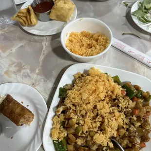 Kung-pao chicken with the &quot;fried rice&quot; pink flower egg roll, cheese puffs, chicken pho.