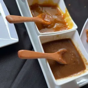 (From top) mint, pickled mango, and tamarind dipping sauces for the Onion Bhaaji