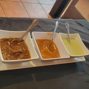 Chutney selection served. Mint, mango, and tamarind.  Very good