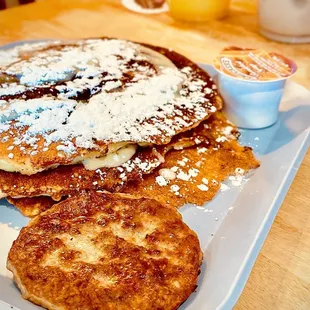 Cinnamon Roll Pancakes with sausage and syrup