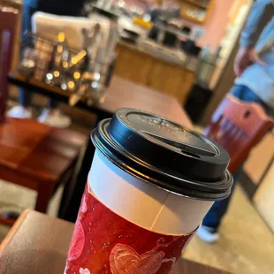 a coffee cup on a table