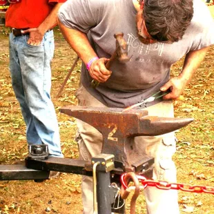 Work on a metal sign