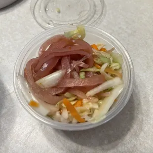 A small serving of coleslaw
