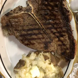 T-bone steak with baked potato