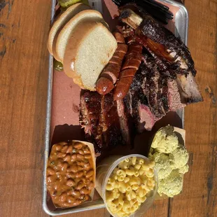 Beef Rib, Prime Brisket, jalapeño cheese Smoked jalapeño cheese Sausage Link, Pork Ribs, Potato Salad, Mac and Cheese, Beans.