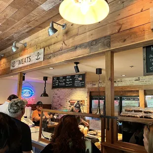 Order cafeteria style with meats sold by the pound