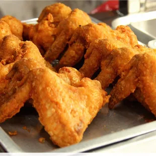 a tray of fried chicken