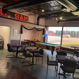 a pool table and a billiard machine