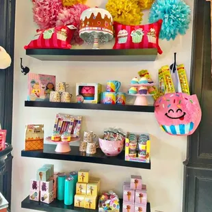 a display of colorful pom poms