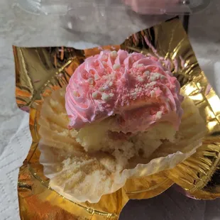 Delicious strawberry cupcake with real strawberry center.