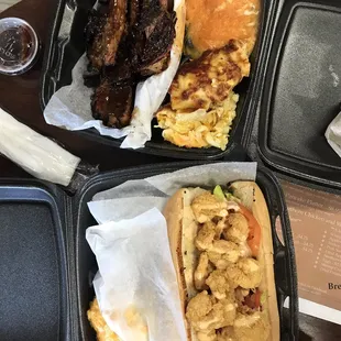 Pecan Wood Smoked Ribs with mac&apos;n cheese and sweet potato casserole. Shrimp Po&apos;Boy with mac&apos;n cheese.