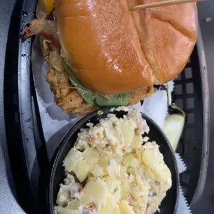 Dubious Chick with loaded potato salad!! Huge sandwich, I couldn&apos;t finish it!!