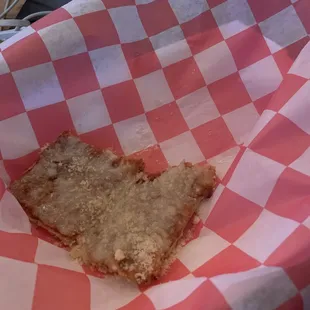 half of a cheese pizza slice