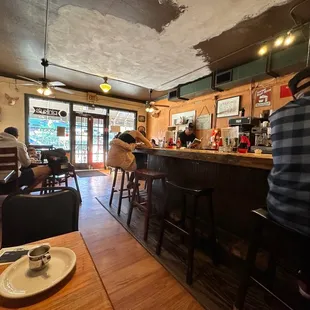 a man sitting at a bar