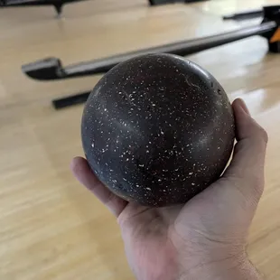 Small duckpin bowling ball no holes fits in palm