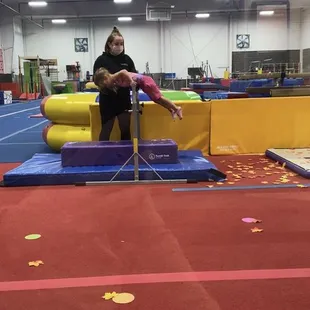 They teach kids to flip over the bars the right