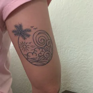Small beach themed tattoo