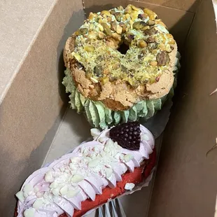 a donut and a cupcake in a box