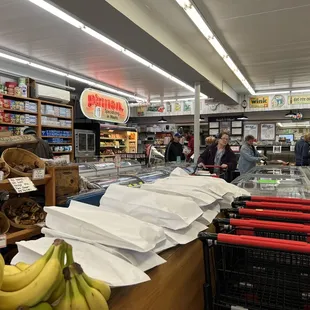 people shopping in a grocery store