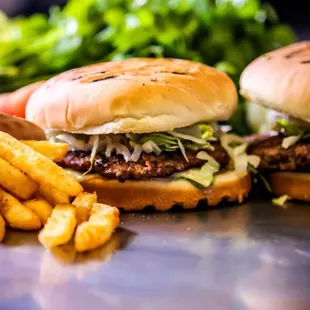 two burgers and french fries