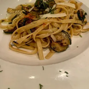a plate of pasta and vegetables