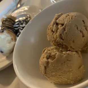 three scoops of ice cream in a bowl