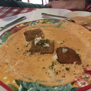 Toasted Ravioli swimming in the sauce. Tasted good, but it&apos;s weird the chef would send a dish out looking like this.