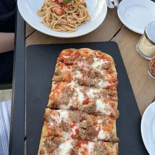 Spaghetti a la Chitarra and a Sausage Pizza