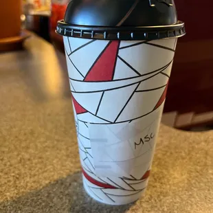 a cup of coffee on a counter