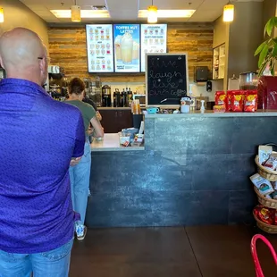 a man standing at the counter