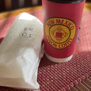 a cup of coffee and a bag of coffee