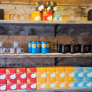 a display of cans and glasses