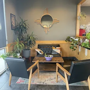 a coffee table and chairs