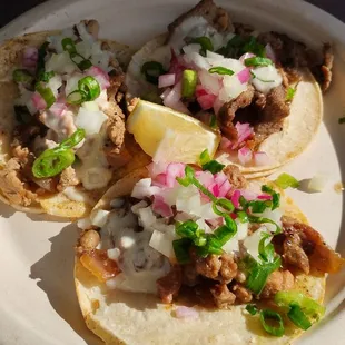 Chicken, pork sisig, pork inihaw tacos