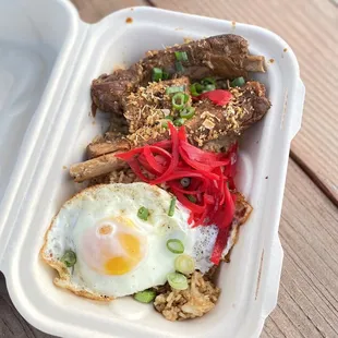 Ribs Adobo over adobo rice: sooo good! Rib meat falls off the bone. Highly recommend!