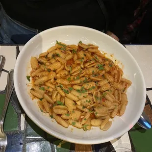a bowl of pasta with sauce