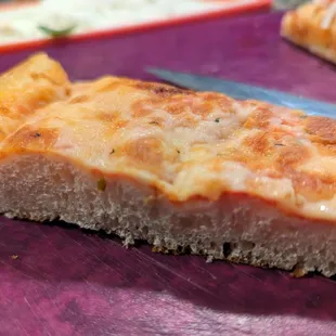 a slice of cheese pizza