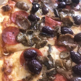 pepperoni, mushrooms, and olives