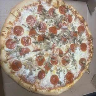 a pepperoni pizza in a box