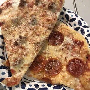 two slices of pizza on a plate