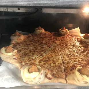 Cheese pizza with coxinha border.